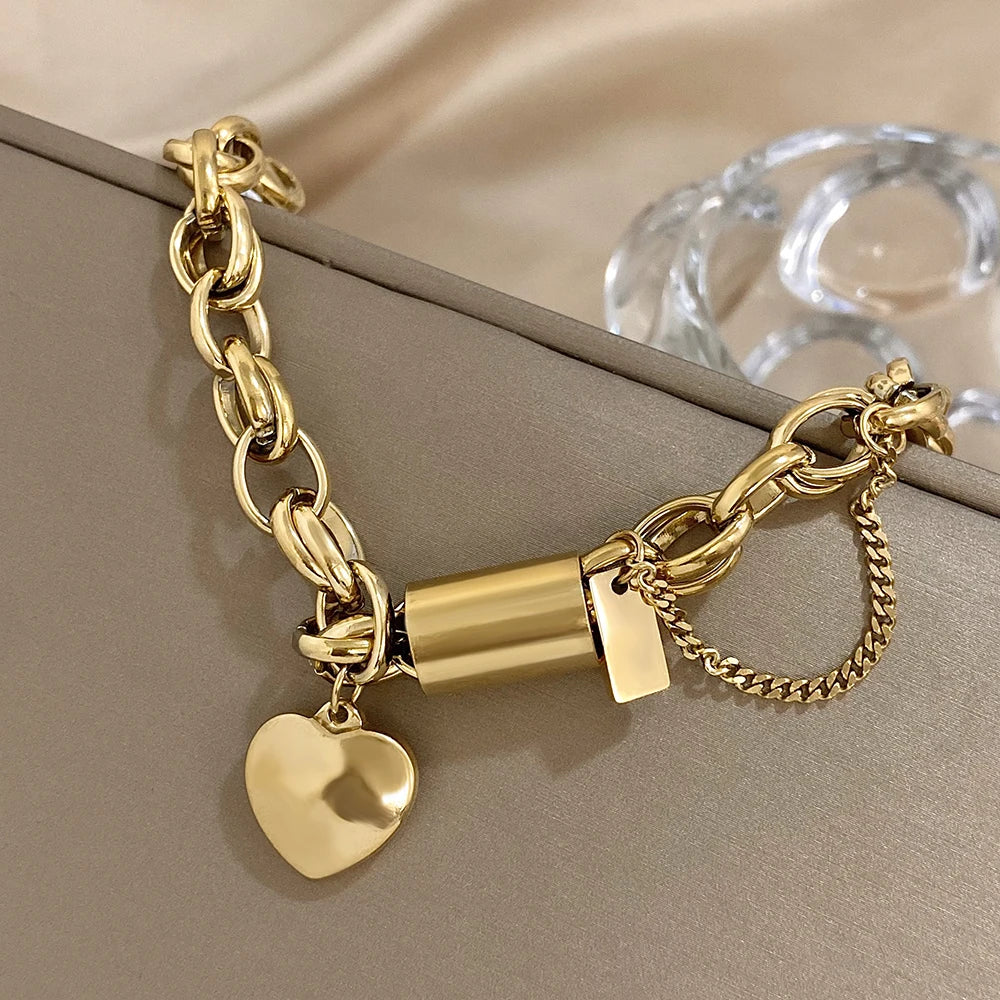 Add a Touch of Luxury with Our Exquisite DZ Fashion Design Gold Color Thick Chain Stainless Steel Bracelets