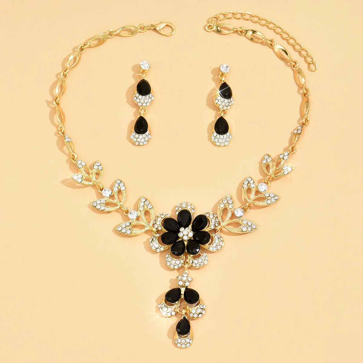 "3 Snazzy Bling Blings: Camellia Water Drop Earrings & Necklace Set for When You Want to Dazzle at Weddings or Just Impress Your Cat!"